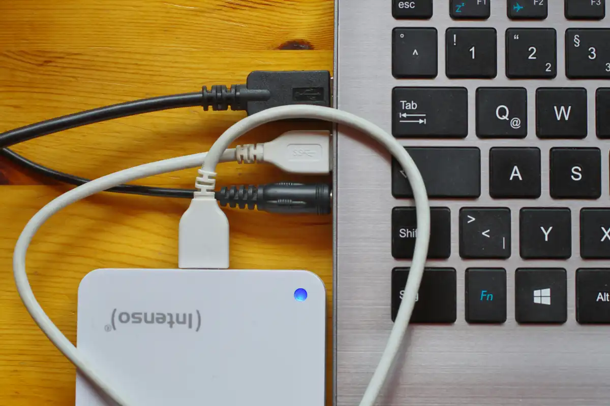 External-hard-drive-plugged-into-side-of-Windows-laptop Laptop's ports and connectivility
